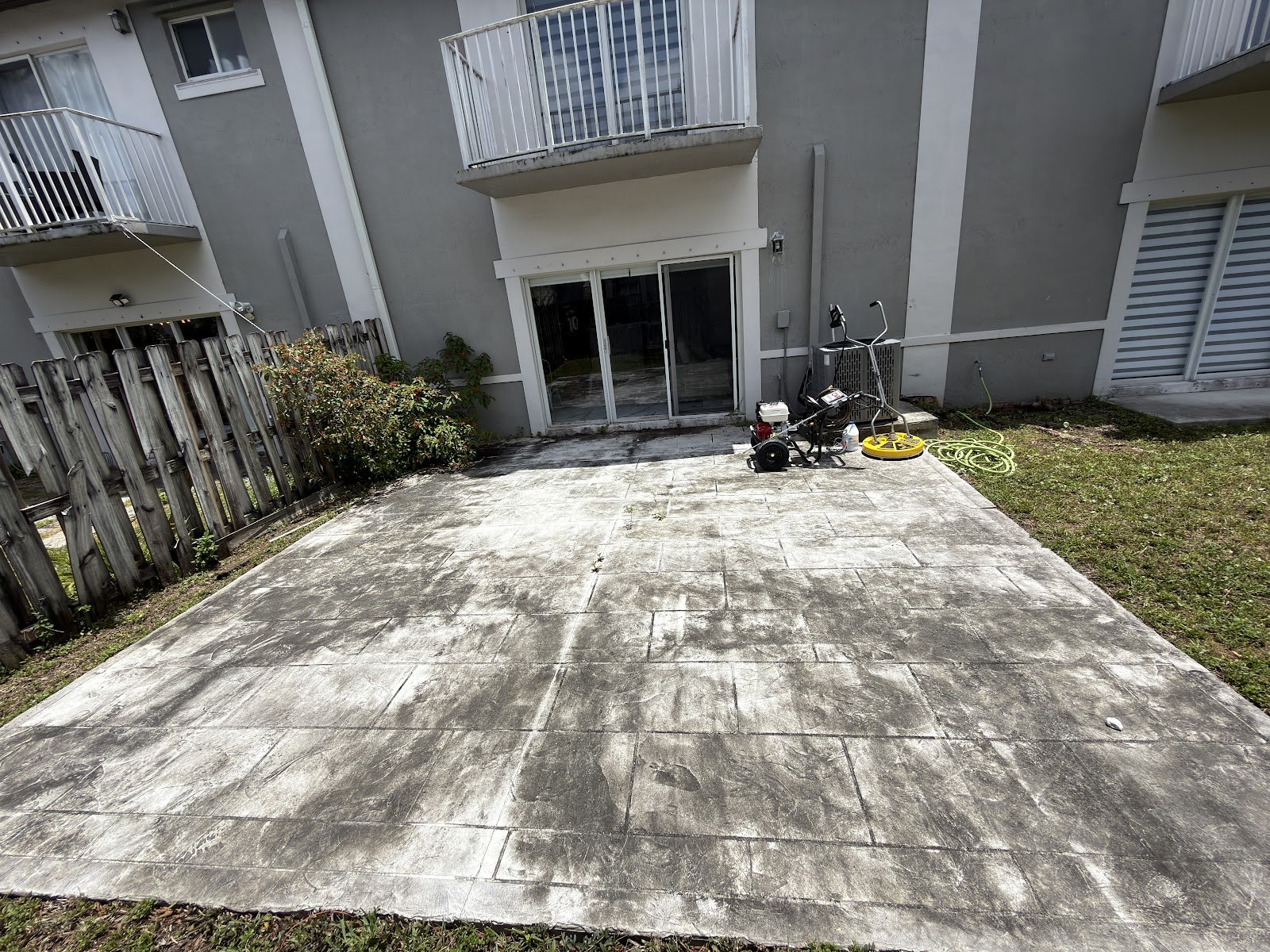 Small concrete patio, freshly washed